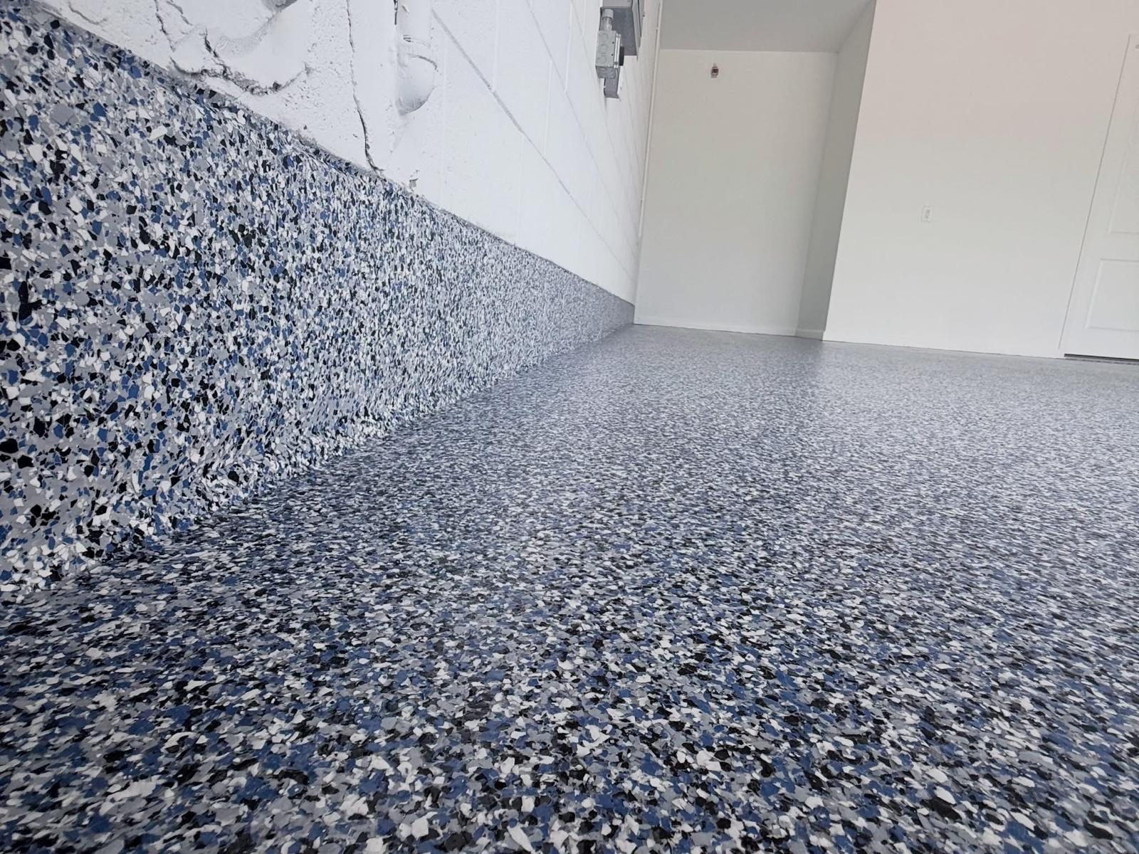 Flake floor running up to the wall