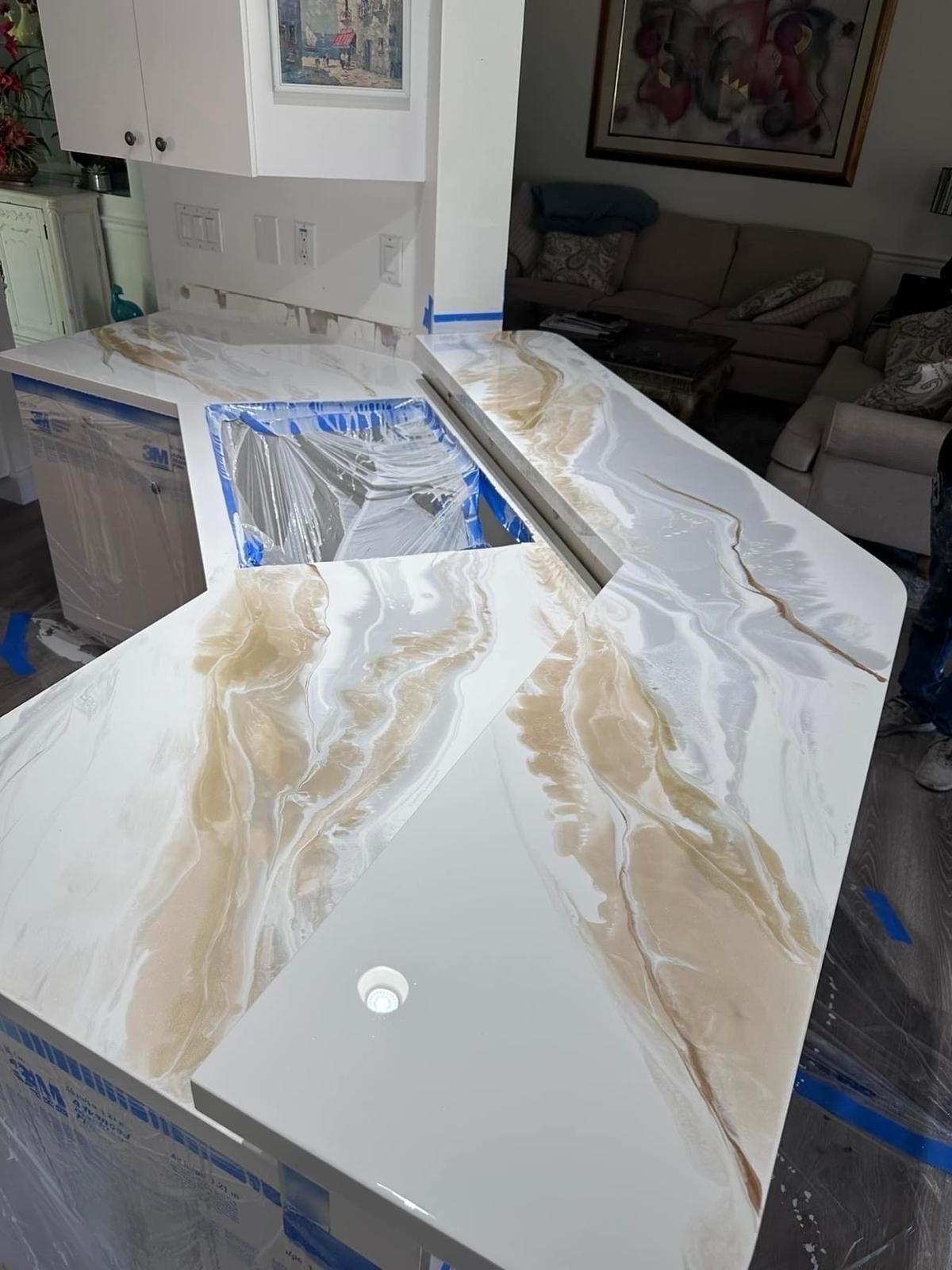 White and gold counter being finished